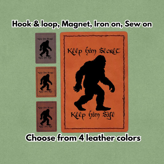 Keep Him Secret Keep Him Safe - Leather Bigfoot Meme Patch - Sasquatch x Lord of the Rings  Yeti - Magnet, Hook and Loop, Iron on and Sew on available in Magnet, Hook and Loop, Iron On and Sew On with four leather color options. Main product image.